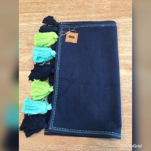New in package Mud Pie tassel table runner.